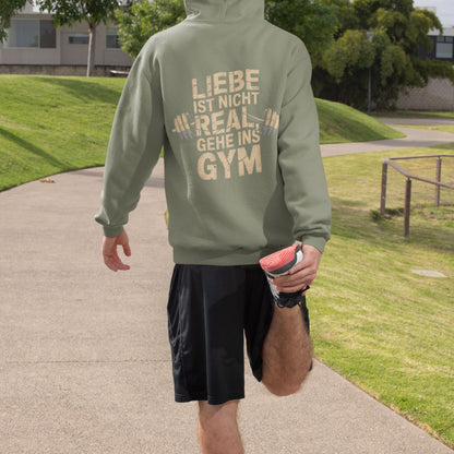 Hoodie mit Hantel-Motiv und Spruch 'Liebe ist nicht real, gehe ins Gym' - Gym Lover's Fashion - Premium Unisex Hoodie